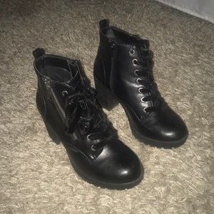 Black heeled moto booties